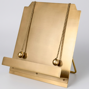 Atril metalico de color dorado para libros | soporte para libro